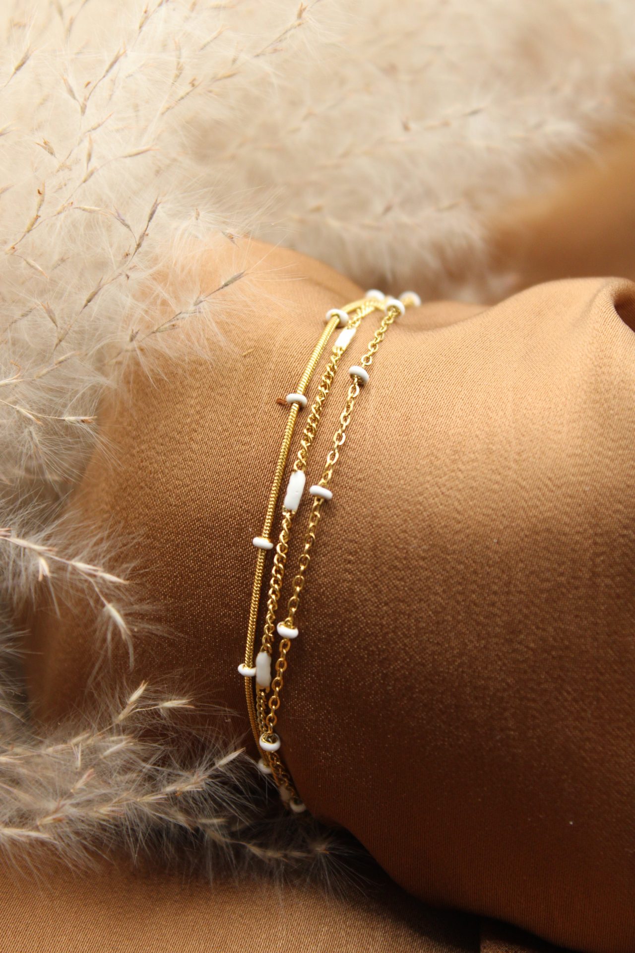 Bracelet multi rang chaine or et blanc