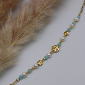 Collier breloque bleu blanc et doré